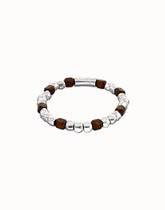 Metal Alloy Elastic Beaded Bracelets Plated In Sterling Silver And Beads In Wood