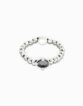 Sterling Silver Plated Metal Beaded Bracelet With A Grey Faceted Crystals And Elastic String