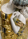 The Kiss Couple Sculpture. Golden Luster