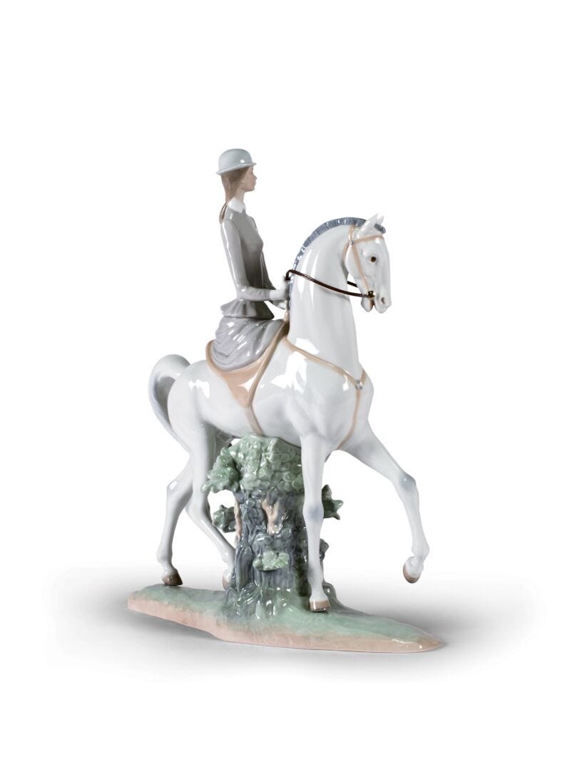 Woman On Horse Figurine