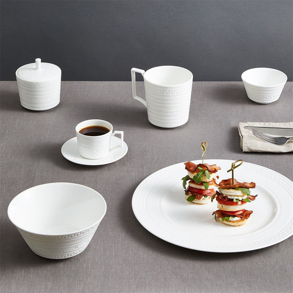 Intaglio Teacup And Saucer