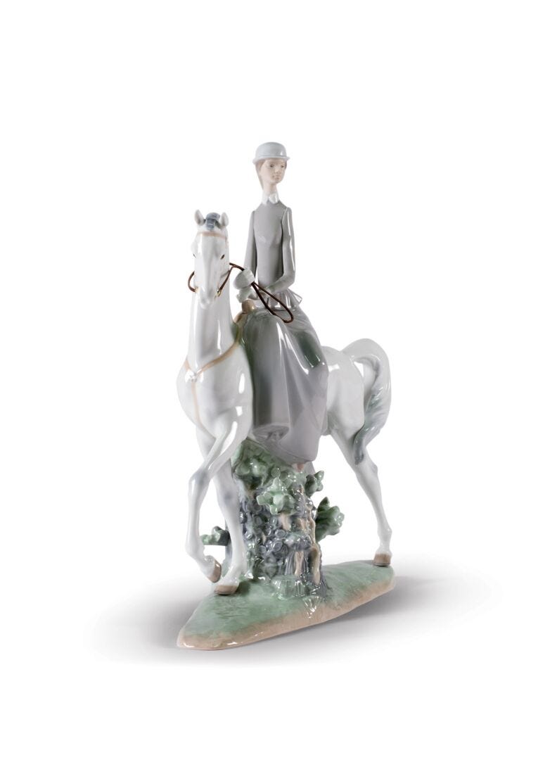 Woman On Horse Figurine