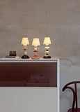Lotus Firefly Table Lamp. Coral