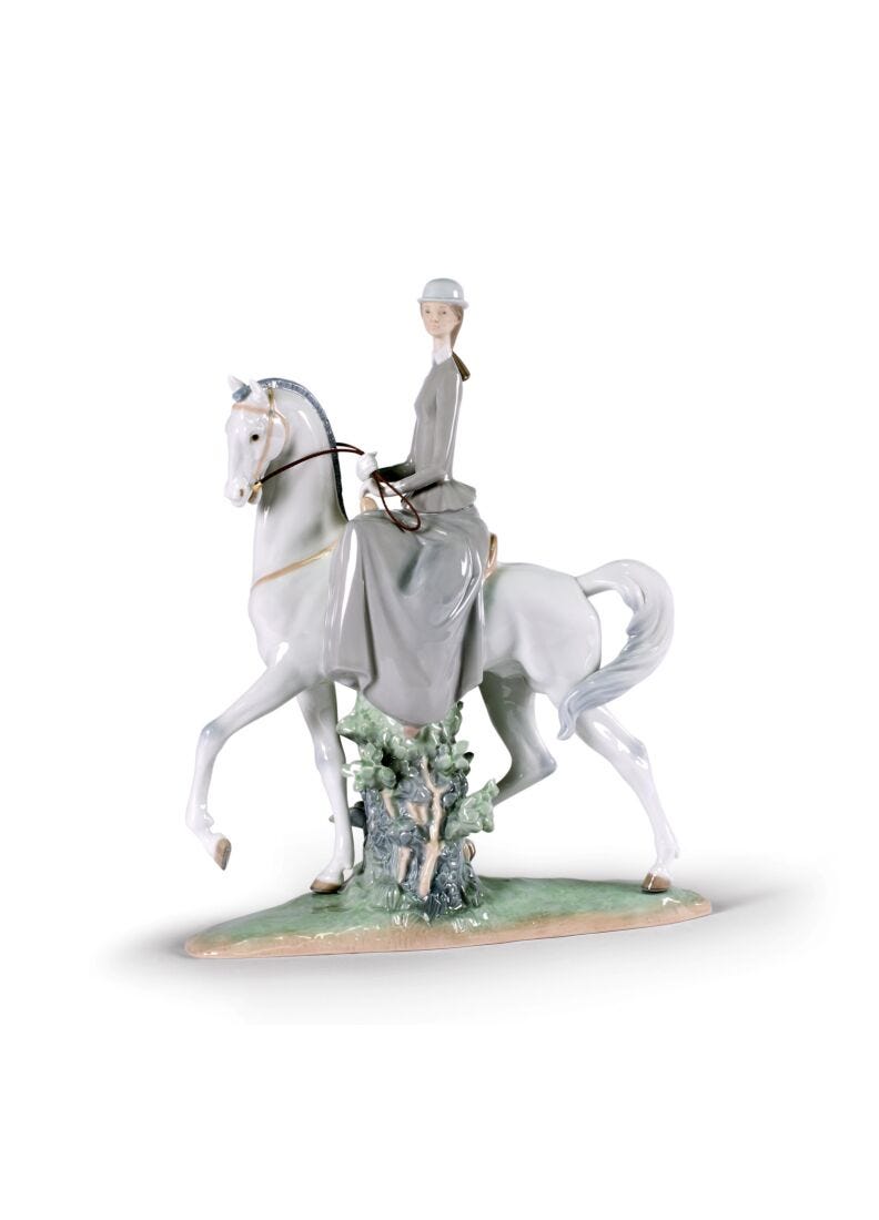 Woman On Horse Figurine