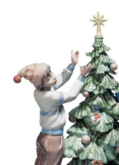 Trimming The Tree Figurine