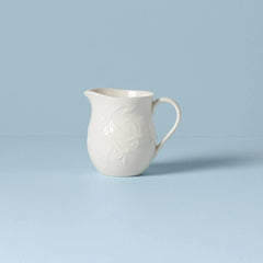 Opal Innocence Carved Creamer