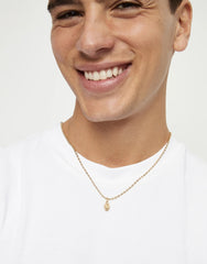 Charm In The Shape Of A Skull - Gold