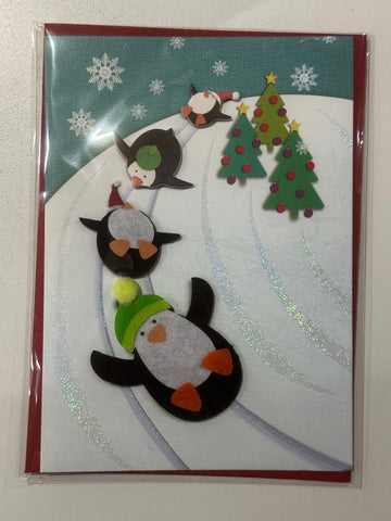 Sliding Penguins Christmas Greeting Card (Limited Quantities)