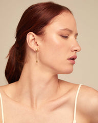 Drop Earrings With Hanging Chain And Small Hearts - Gold