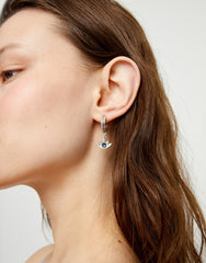 Hoop Earrings Plated In Sterling Silver With An Eye Detail And Faceted Crystal In Blue