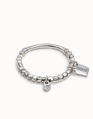 Beaded Stretch Bracelet With Tubular Piece And A Charm