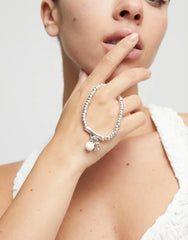 Beaded Stretch Bracelet With A Murano Glass And A Horseshoe Charm