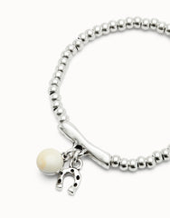 Beaded Stretch Bracelet With A Murano Glass And A Horseshoe Charm