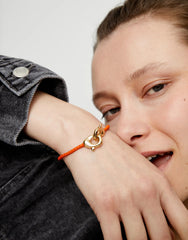 Orange Leather Women Bracelet With Interlocked Carabiner Detail In Gold