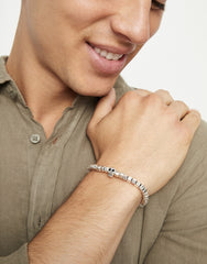 Metal Alloy Elastic Bracelet Pleated In Sterling Silver With A Skull Detail
