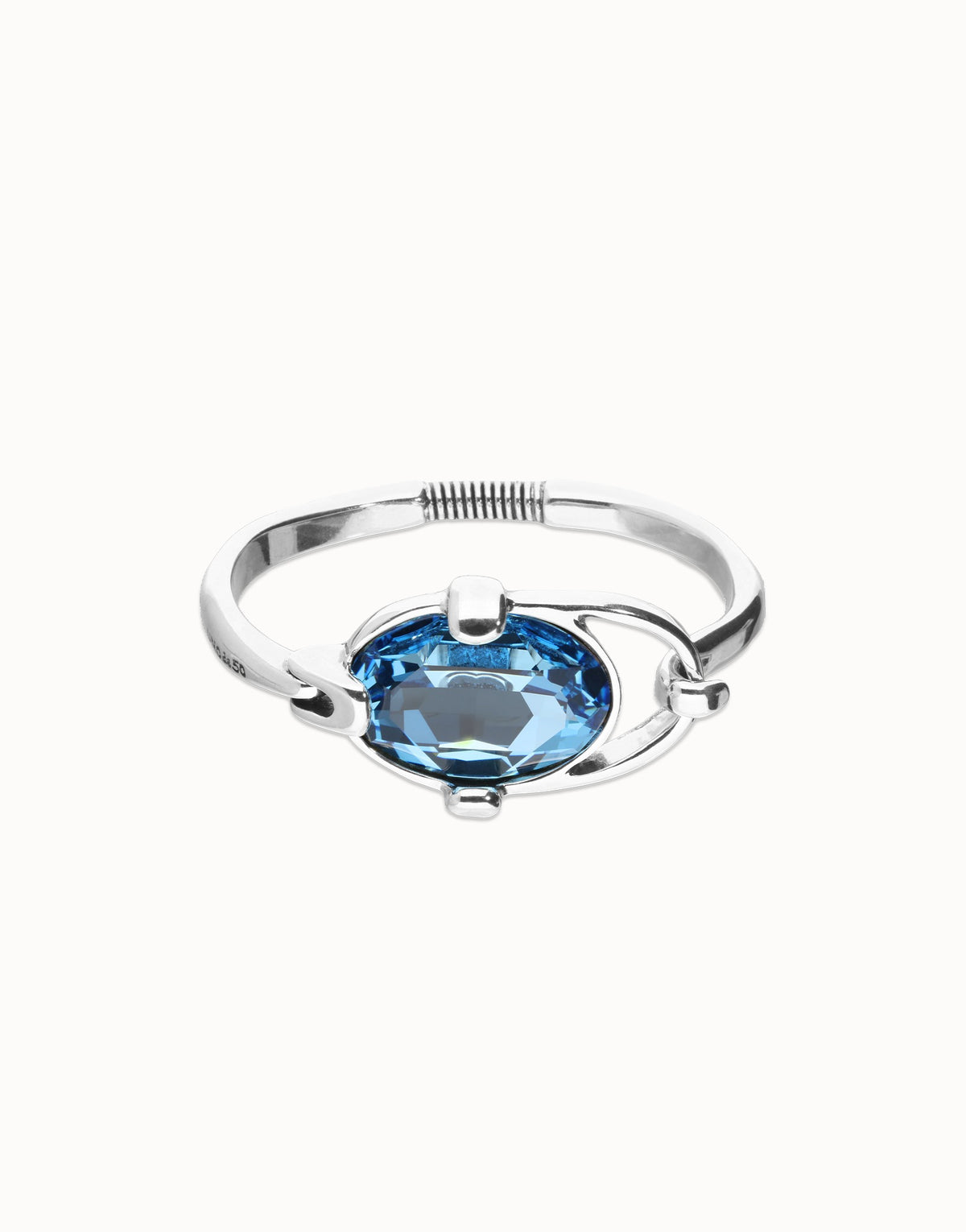 Rigid Bracelet Of Metal Alloy Plated In Sterling Silver With A Blue Faceted Crystal