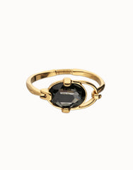 Rigid Bracelet Of Metal Alloy Plated In Gold 18K With A Grey Faceted Crystal