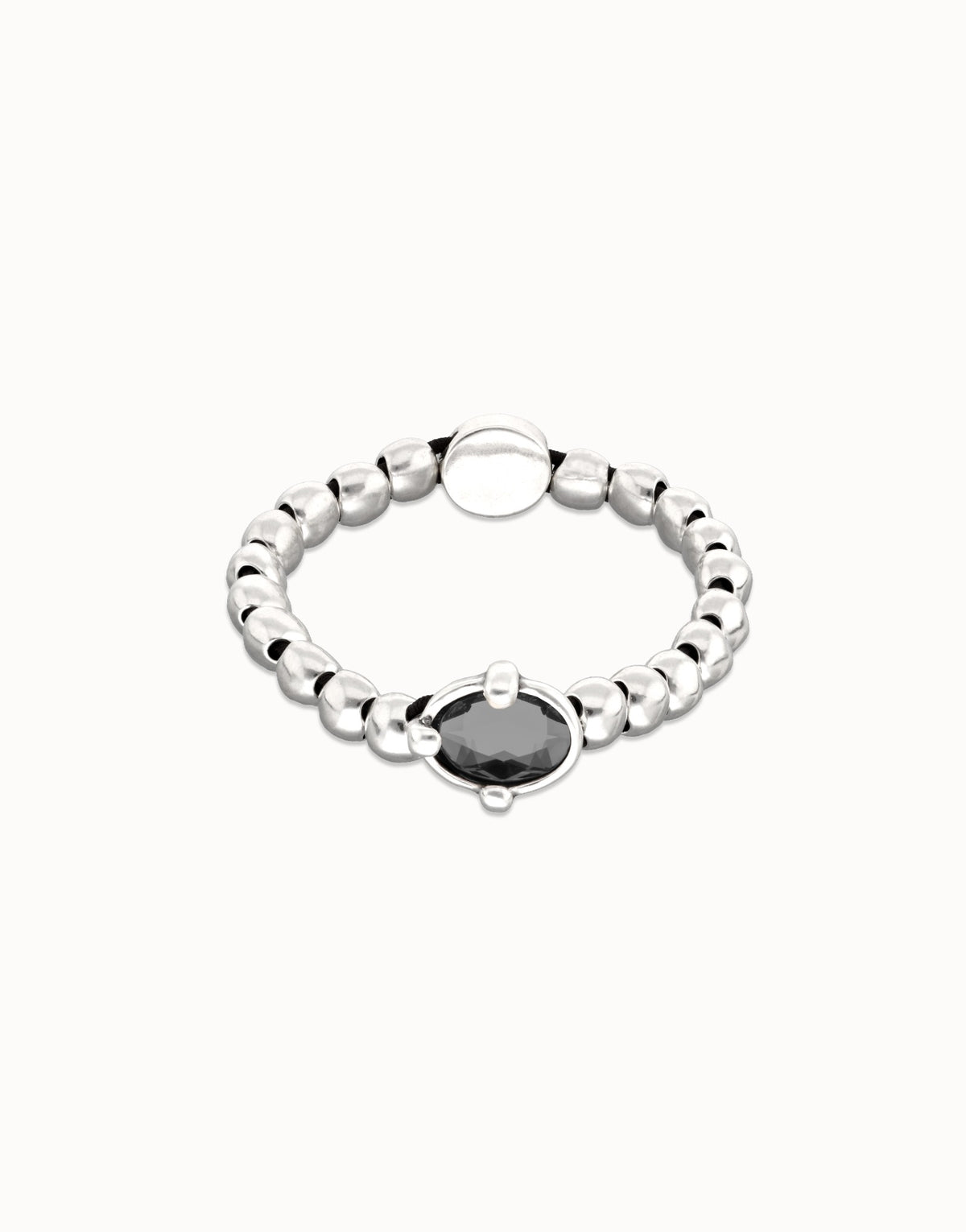 Sterling Silver Plated Metal Beaded Bracelet With A Grey Faceted Crystals And Elastic String