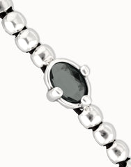 Sterling Silver Plated Metal Beaded Bracelet With A Grey Faceted Crystals And Elastic String