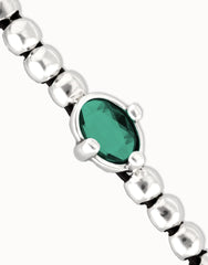 Sterling Silver Plated Metal Beaded Bracelet With A Green Faceted Crystals And Elastic String