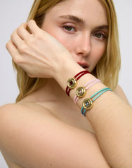 Double Red Leather Bracelet With A Metal Alloy Eye Detail Pleated In Gold 18K And Crystal