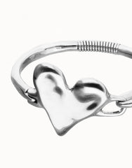 Metal Alloy Semi Rigid Bracelet Plated In Sterling Silver With Heart Detail