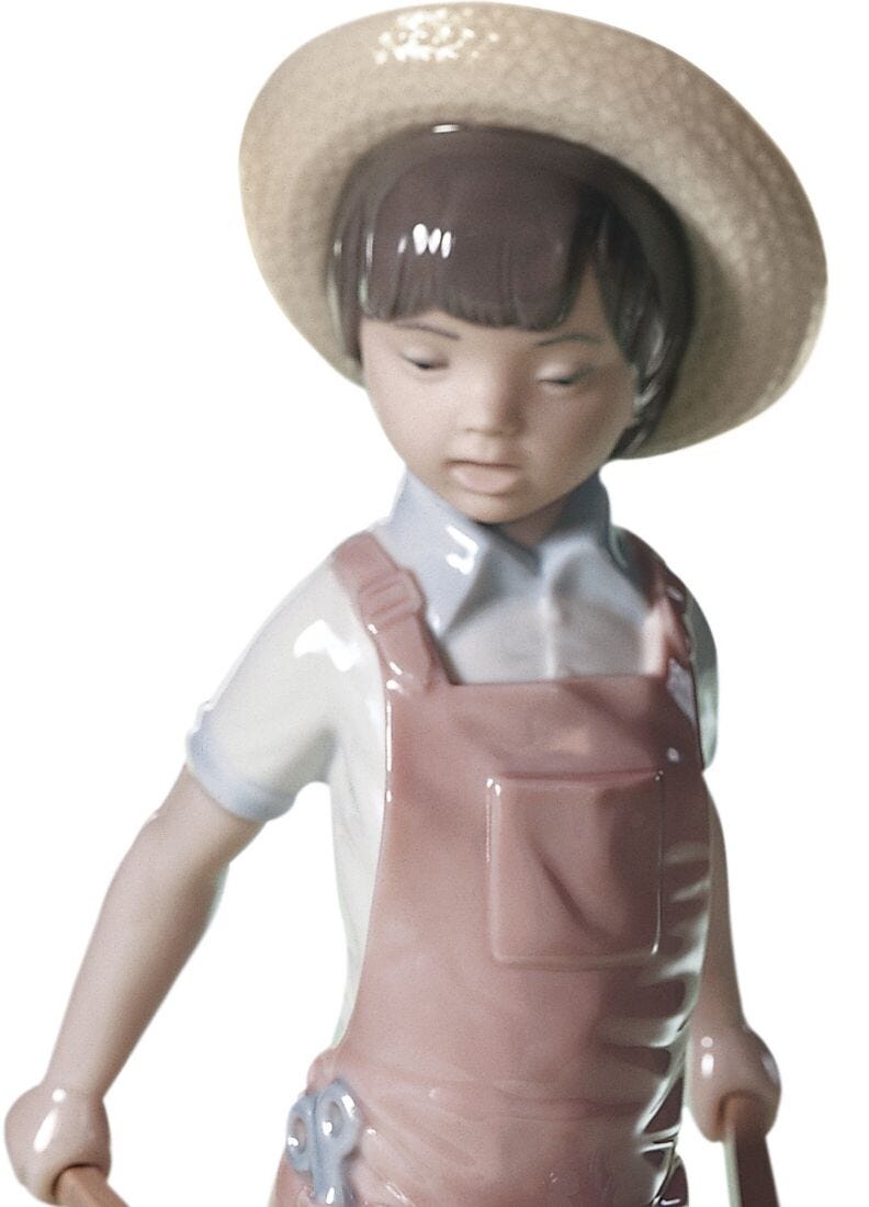 Wheelbarrow With Flowers Boy Figurine