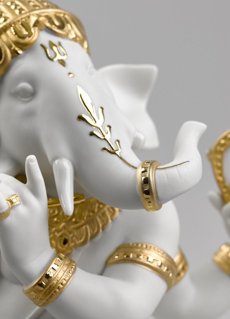 Bansuri Ganesha Figurine. Golden Lustre