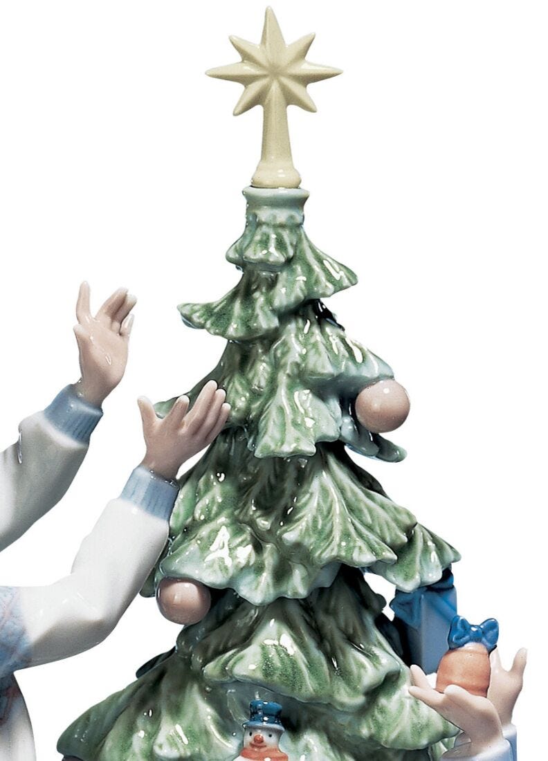 Trimming The Tree Figurine