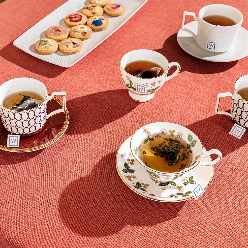 Intaglio Teacup And Saucer