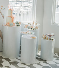 Simply Chic White Cylinder Pedestal Display Rental