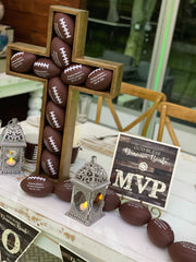 Vintage Football Filled Cross Centerpiece Rental