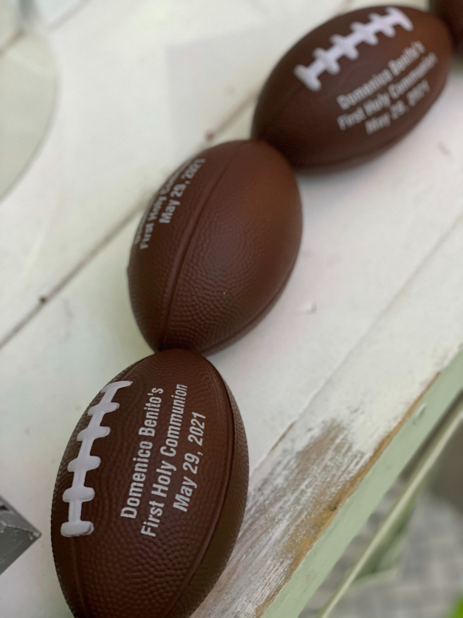 Football Filled Vase Centerpiece w Branches Rental